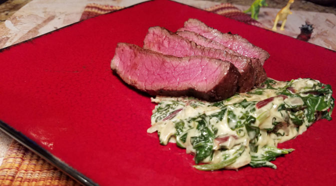 Cocoa-Ancho Rubbed Steaks with Creamy Parmesan Greens